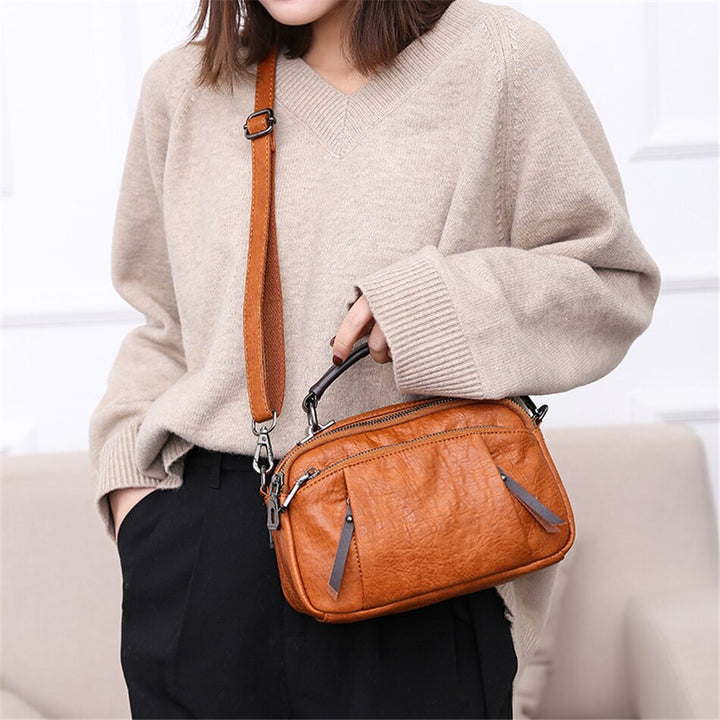 Borsa a mano per donna, vivaci colori, tracolla removibile. Perfetta per aggiungere stile al tuo outfit.