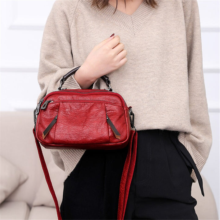 Nuova borsa a mano donna, stile unico multicolore, perfetta per un look quotidiano e versatile.