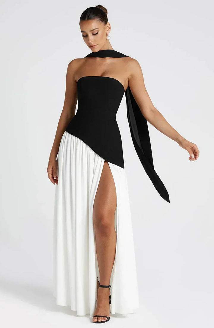 Moda femminile: abito lungo asimmetrico, senza maniche, con spacco laterale. Perfetto per occasioni.