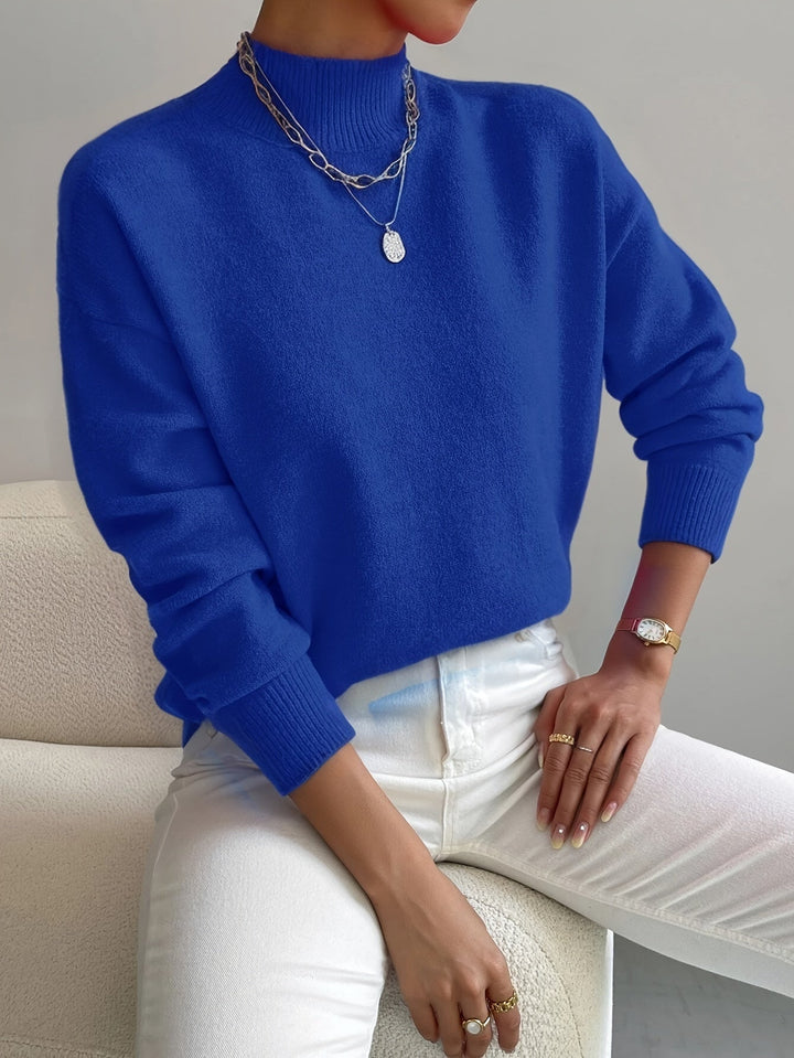 Pullover donna in morbida maglieria, collo alto. Caldo e versatile per autunno/inverno, look casual o eleganti.