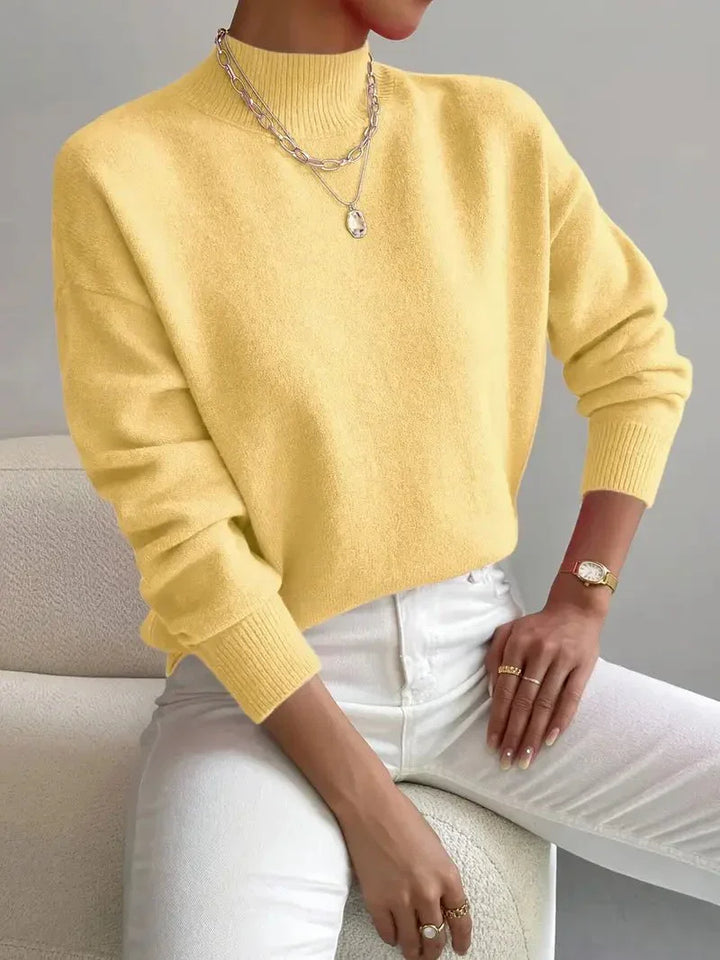 Maglione donna caldo e morbido con collo alto. Maglieria invernale/autunnale elegante e confortevole.