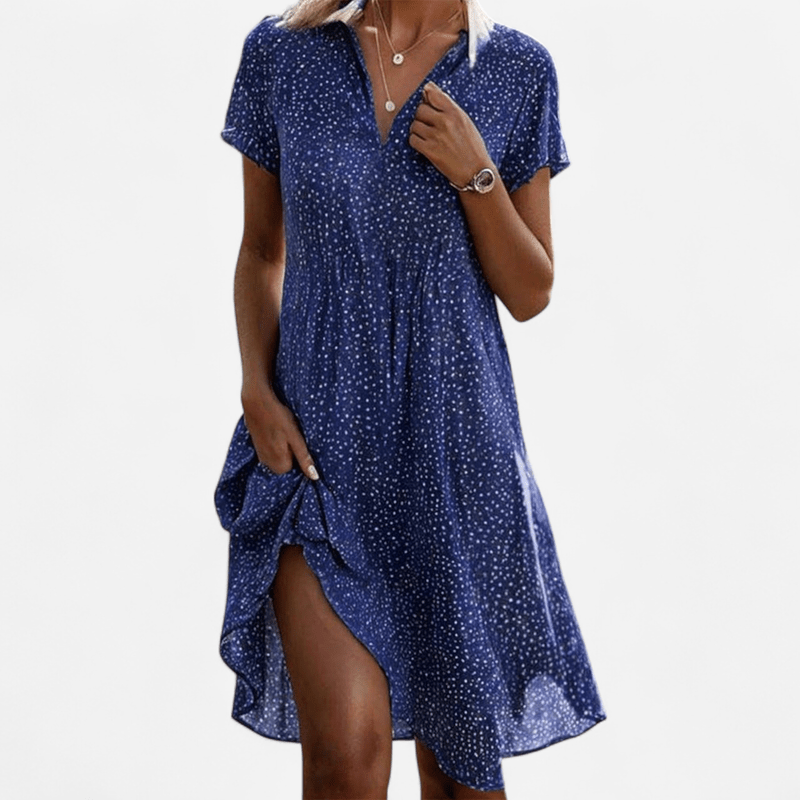 Vestito donna viola a pois, stile fluido e comodo. Abito midi estivo con colletto revers.