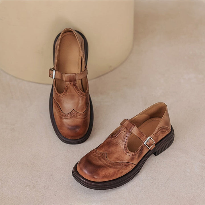 Scarpe Mary Jane da donna marroni con suola antiscivolo. Calzature comode e casual, perfette per moda autunno inverno.