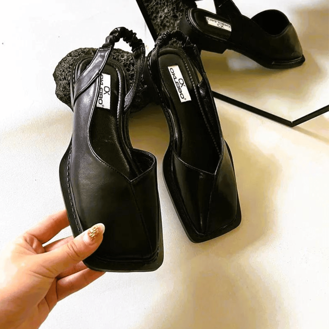 Scarpe in pelle da donna, modello slip-on per un look elegante senza sforzo al lavoro.