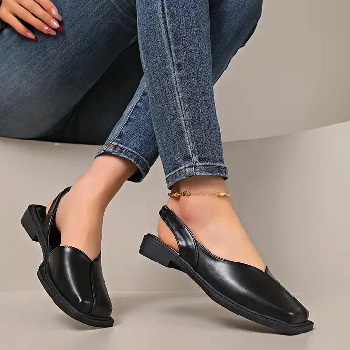 Versatili scarpe basse slip-on in pelle per donna, ideali per abbinamenti casual e formali.