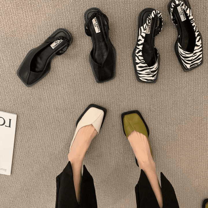 Comfort e stile con queste scarpe basse slip-on da donna in pelle, perfette per l'ufficio.
