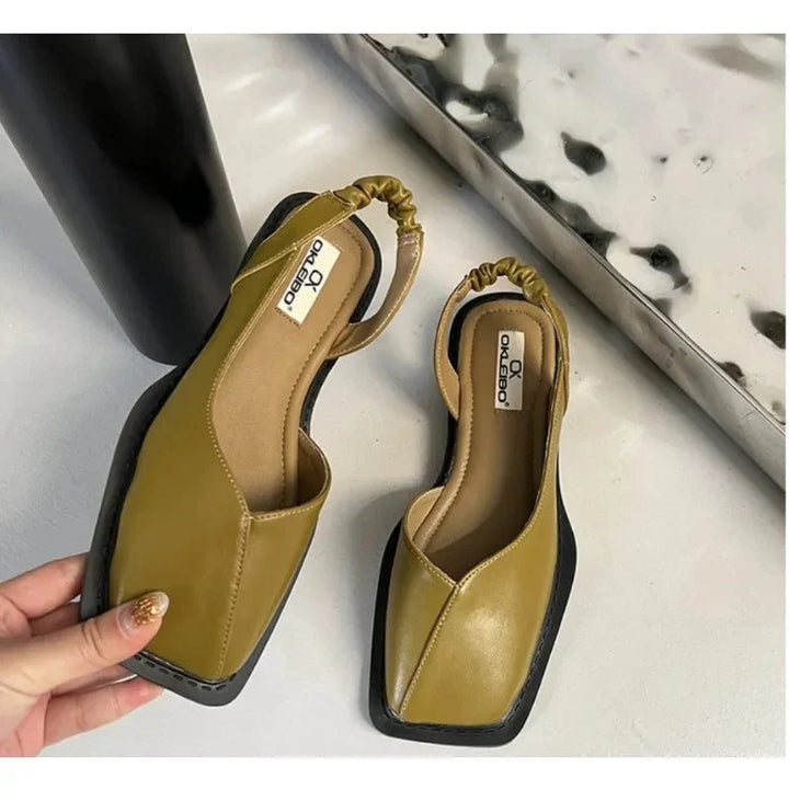 Eleganti scarpe basse da donna in pelle, pratiche slip-on per comfort duraturo.