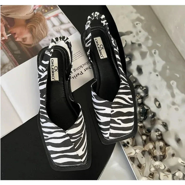 Scarpe casual donna slip-on in morbida pelle, perfette per ogni occasione quotidiana.