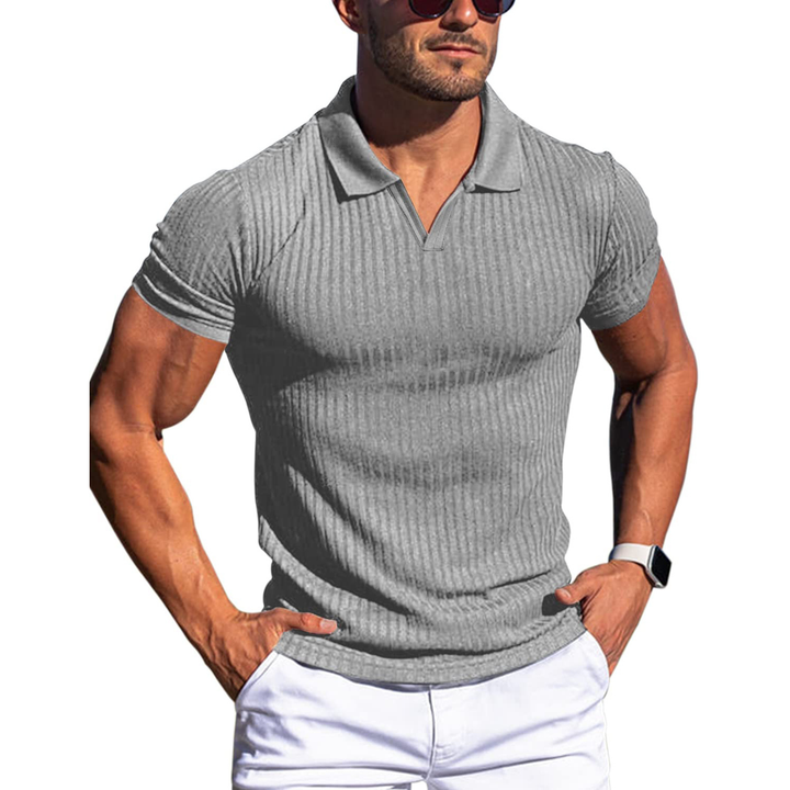 Polo uomo casual elegante, aderente e a coste, maniche corte, versatile per un look moderno e raffinato in estate.