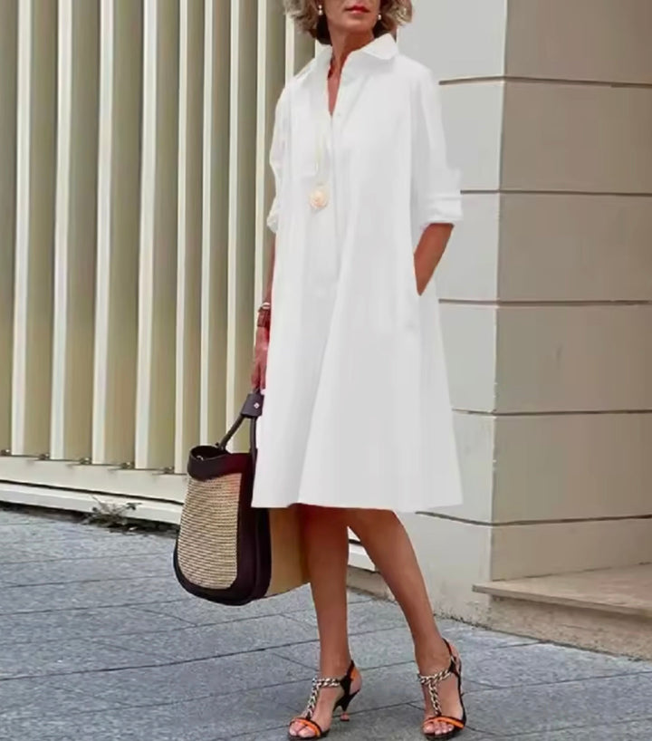 Abito donna midi stile camicia elegante con pratiche tasche nascoste. Moda primavera/estate.