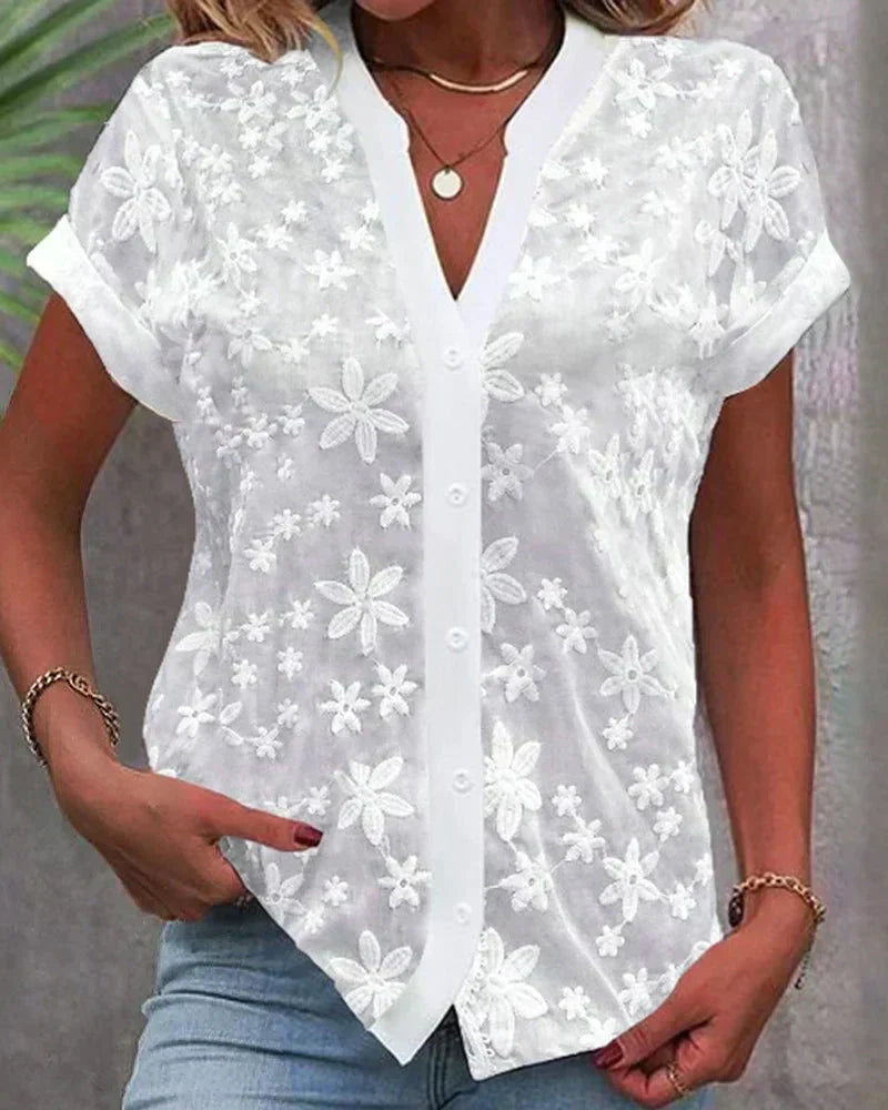 Top femminile floreale per primavera estate, camicetta elegante da donna con scollo a V e bottoni frontali.