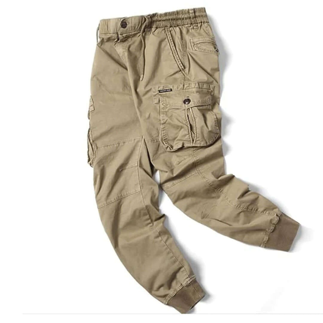 Jogger cargo uomo grigi, stile moderno e sportivo, con ampie tasche laterali per il tempo libero.