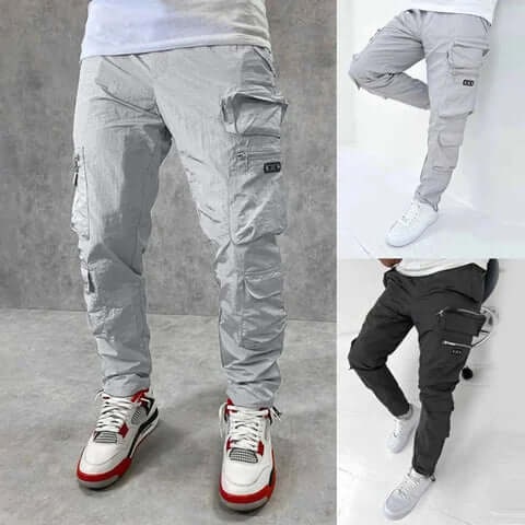 Pantaloni cargo uomo dal design affusolato, con dettagli di tasche cargo e cintura regolabile per comfort urbano.