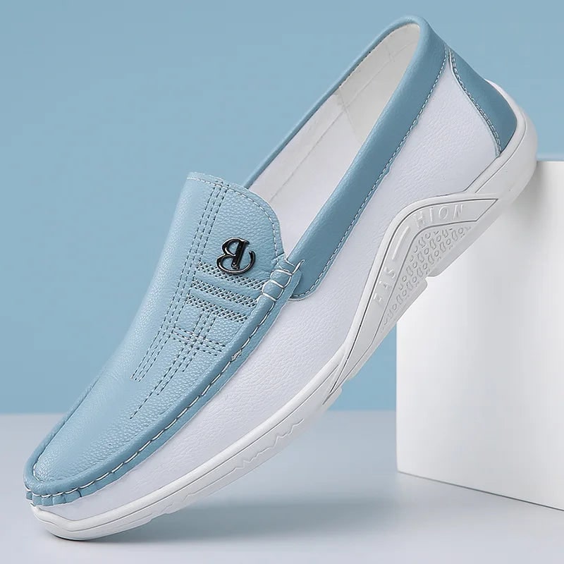 Mocassini uomo casual slip-on neri con cuciture a contrasto, perfetti per primavera ed estate.