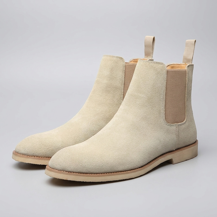Moda maschile: stivali Chelsea uomo neri alla caviglia. Calzature classiche slip-on, perfette per outfit eleganti e moderni.