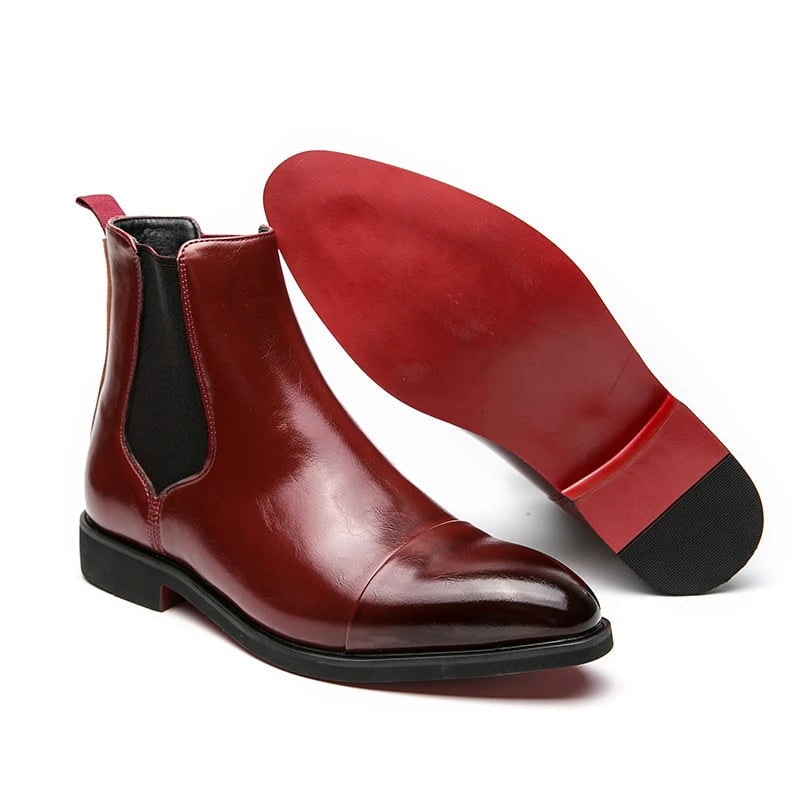 Calzature uomo Chelsea eleganti, punta a cappuccio, design slip-on per comfort e stile distintivo.