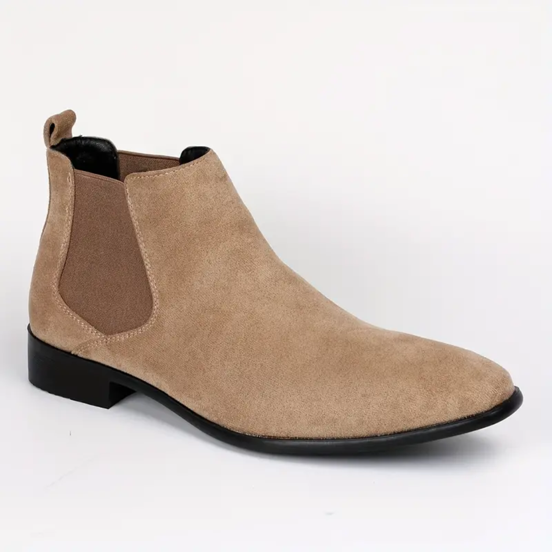 Stivali Chelsea da uomo eleganti neri in pelle liscia, perfetti per look casual o formali.