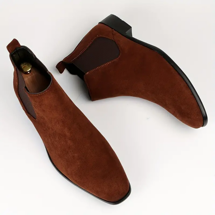 Stivali Chelsea uomo neri alla caviglia, perfetti per passeggio, ufficio e serate eleganti.