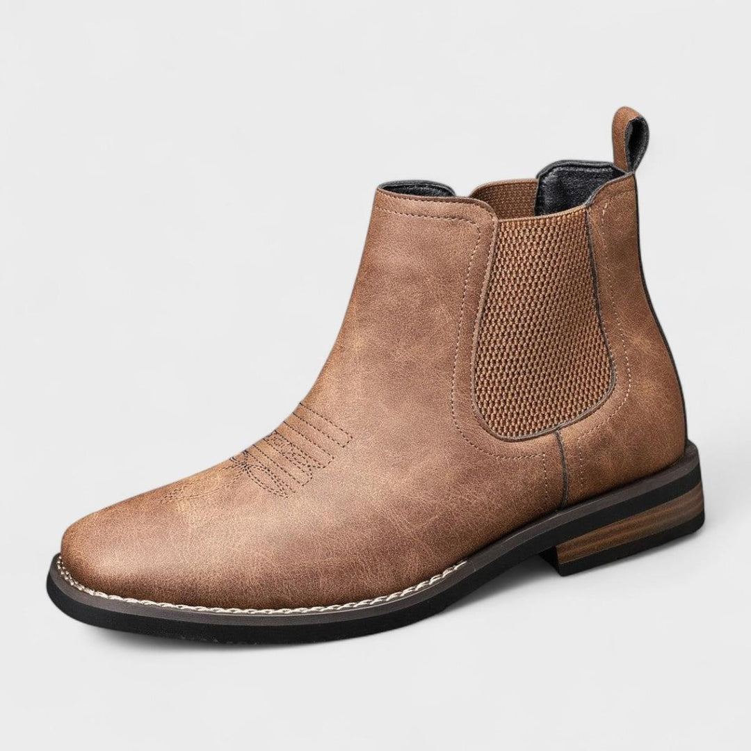 Stivali Chelsea uomo slip-on con punta quadrata stile western. Calzature eleganti casual per moda maschile.