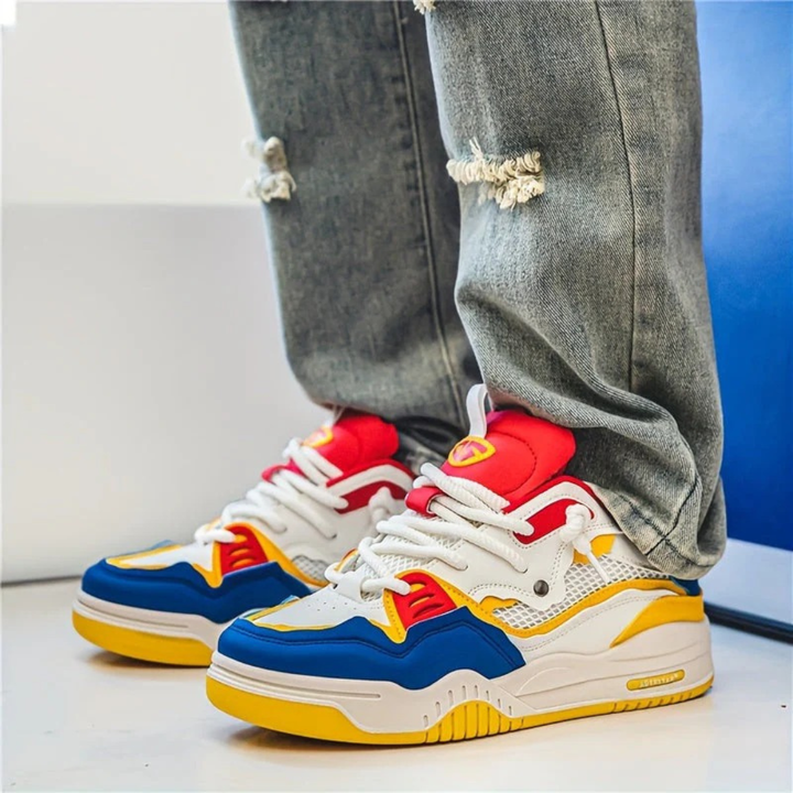 Sneakers chunky uomo nero/grigio, low-top e lacci spessi. Stile moderno e comfort per streetwear.