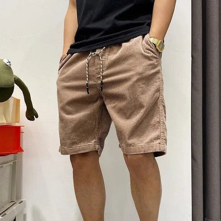 Shorts casual da uomo con vestibilità rilassata, ideali per spiaggia ed estate. Coulisse per comfort regolabile.