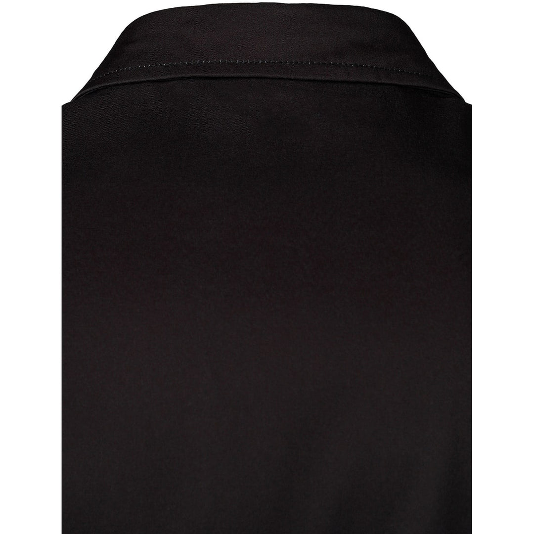 Camicia Mariachi uomo con bottoni neri. Ideale per Halloween, feste a tema, cosplay o travestimenti unici.