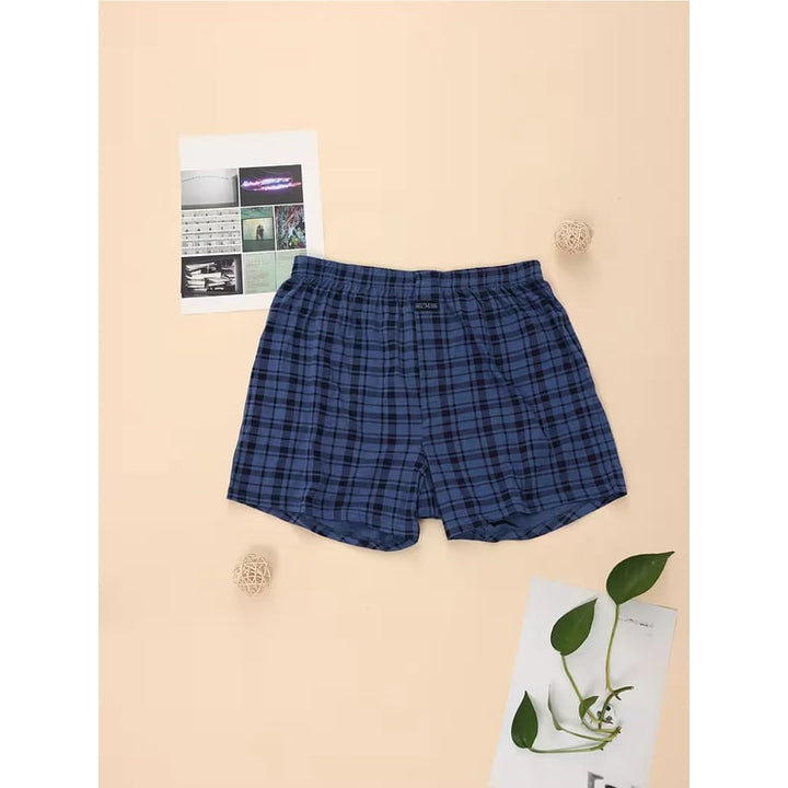 Intimo maschile comodo: boxer da uomo a fantasia scozzese, con vita elastica e vestibilità morbida.
