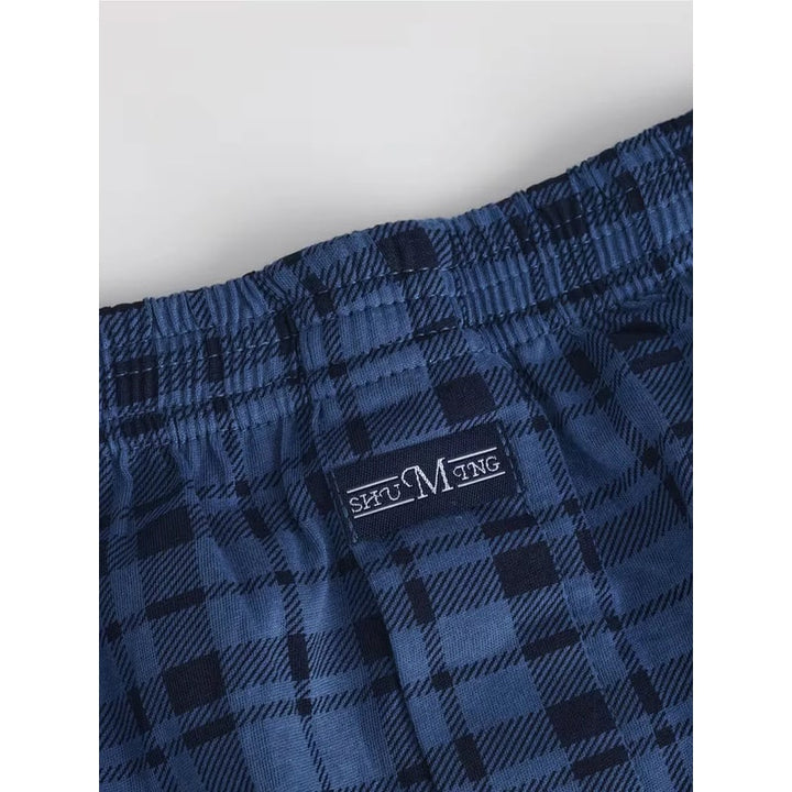 Boxer intimo maschile in morbido tessuto con fantasia scozzese, vita elastica per comfort duraturo.