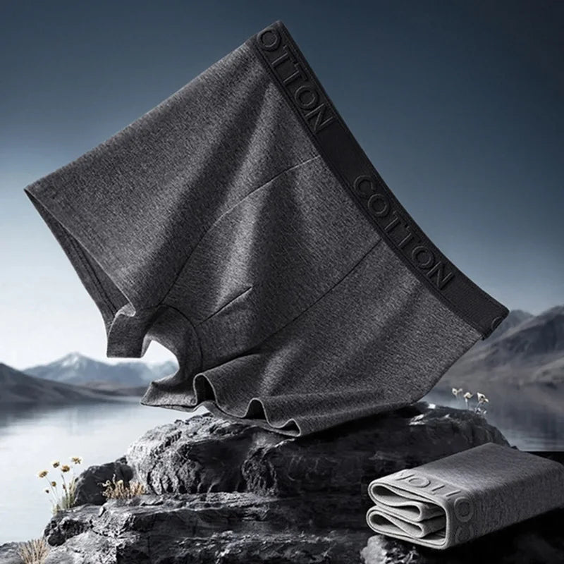 Dettaglio elastico in vita dei boxer uomo confortevoli, con logo discreto, per una vestibilità morbida e sicura.