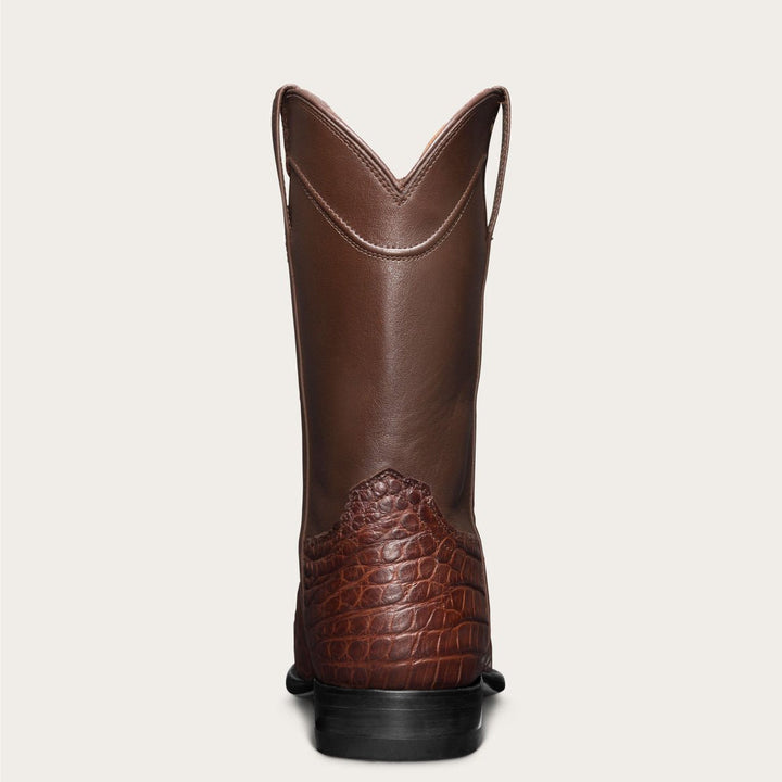 Moda maschile: stivali cowboy neri con punta tonda e stampa coccodrillo. Essenziali per il tuo stile western.