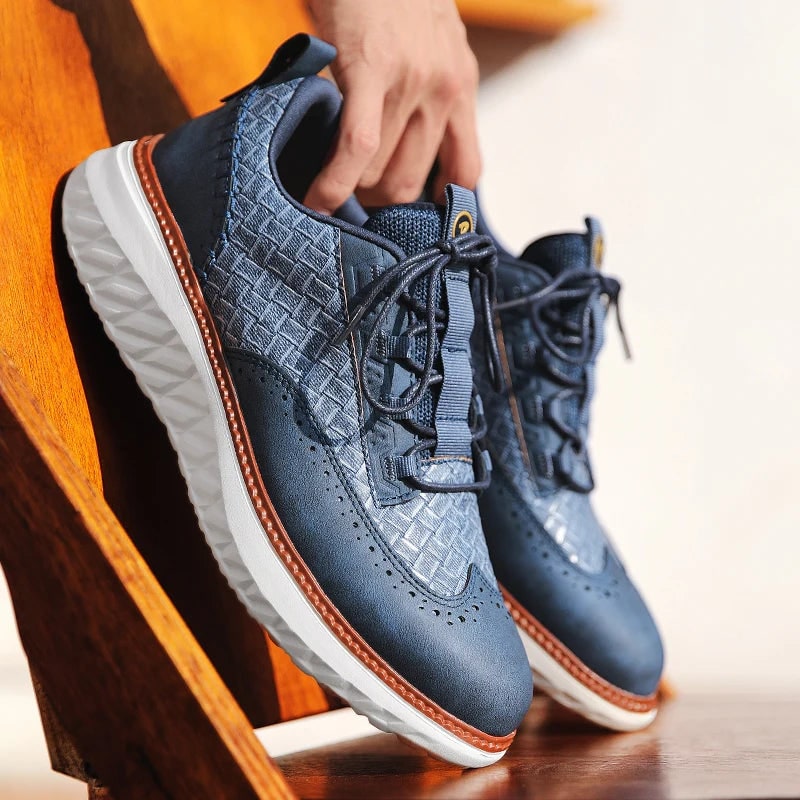 Sneakers ibride da uomo con brogue e pannelli intrecciati. Stile elegante e comfort per ogni occasione.