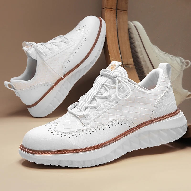Calzature ibride da uomo, sneakers brogue con dettagli intrecciati. Comfort e stile chic per ogni giorno.