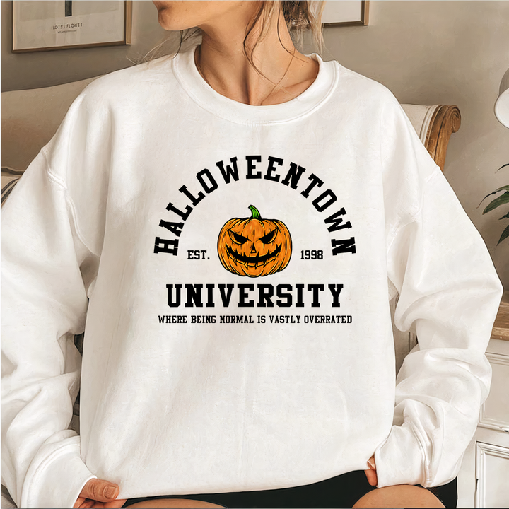 Felpa donna girocollo a tema Halloween, zucca stilizzata per l'autunno. Ideale per abbigliamento casual e feste.