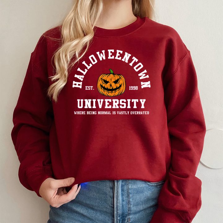 Maglione donna girocollo con grafica zucca di Halloween. Perfetto per un look casual autunnale a tema.