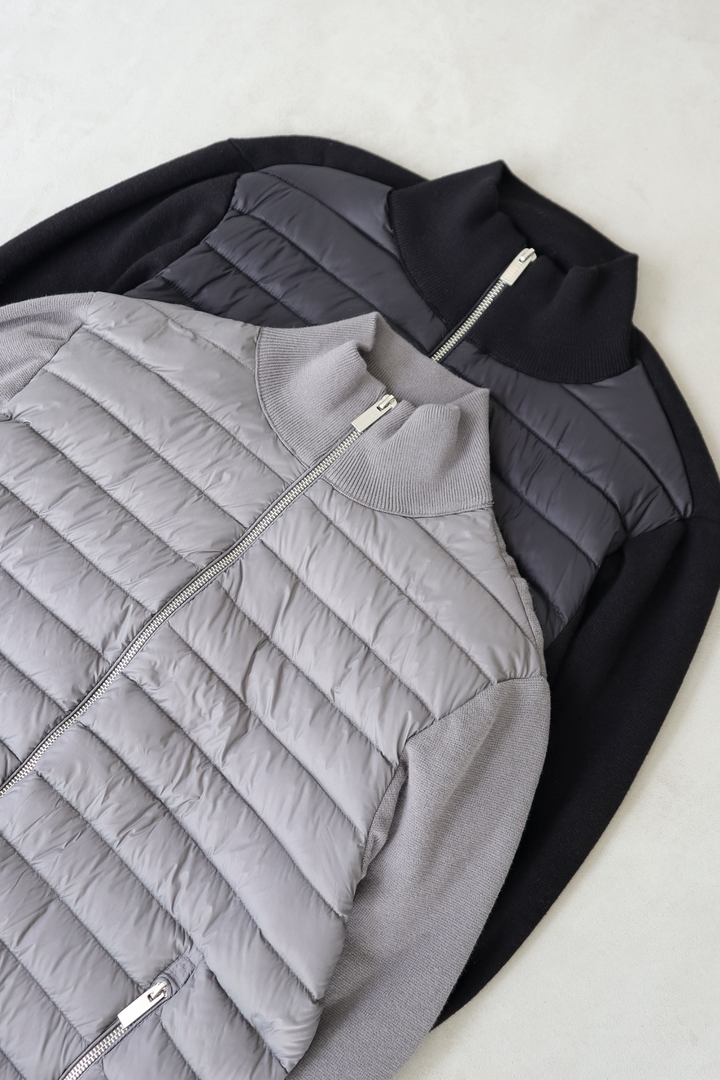 Giacca ibrida uomo trapuntata con maniche in maglia, un'opzione chic per l'abbigliamento casual.