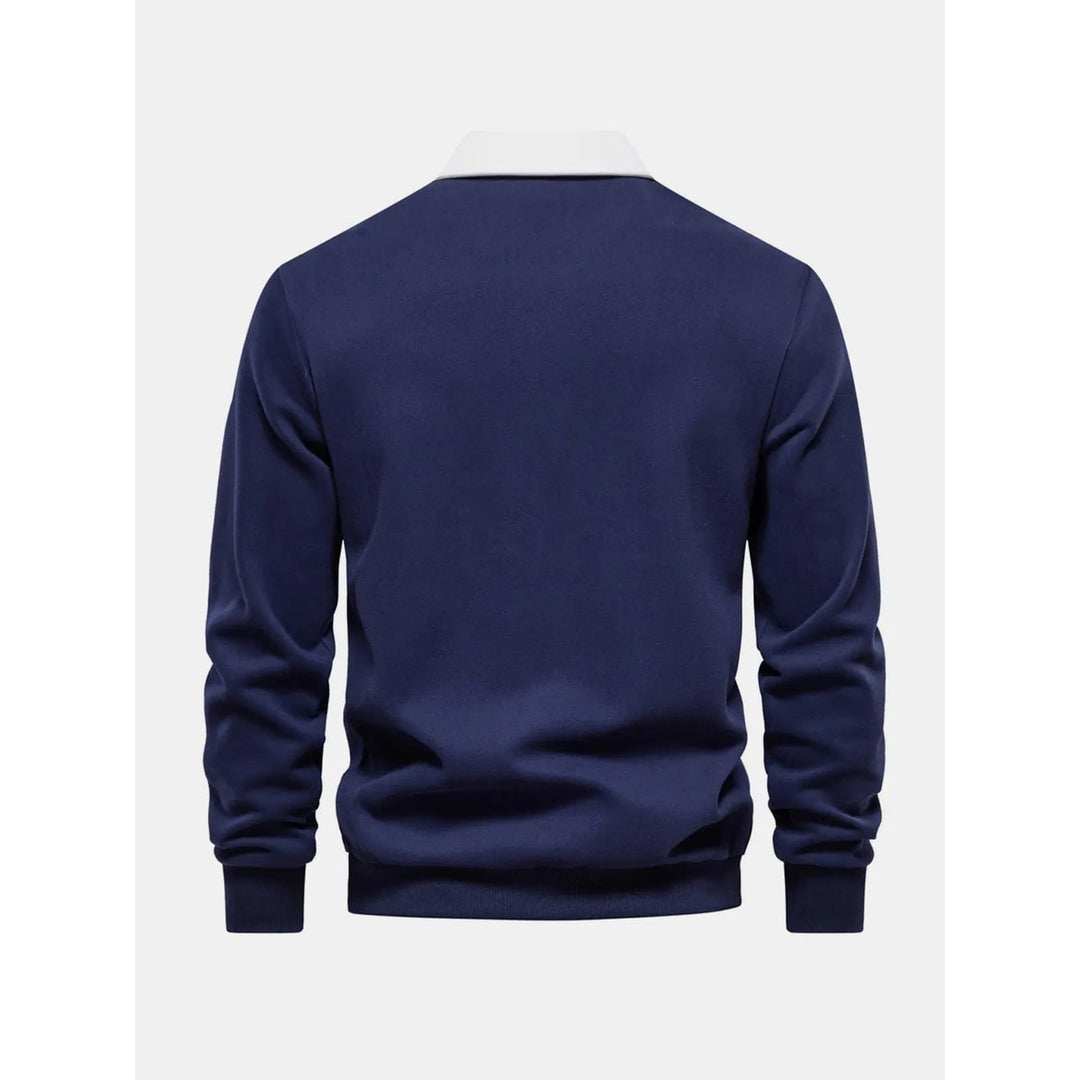 Felpa polo a manica lunga da uomo, dettagli a contrasto, perfetta per un look elegante e confortevole.