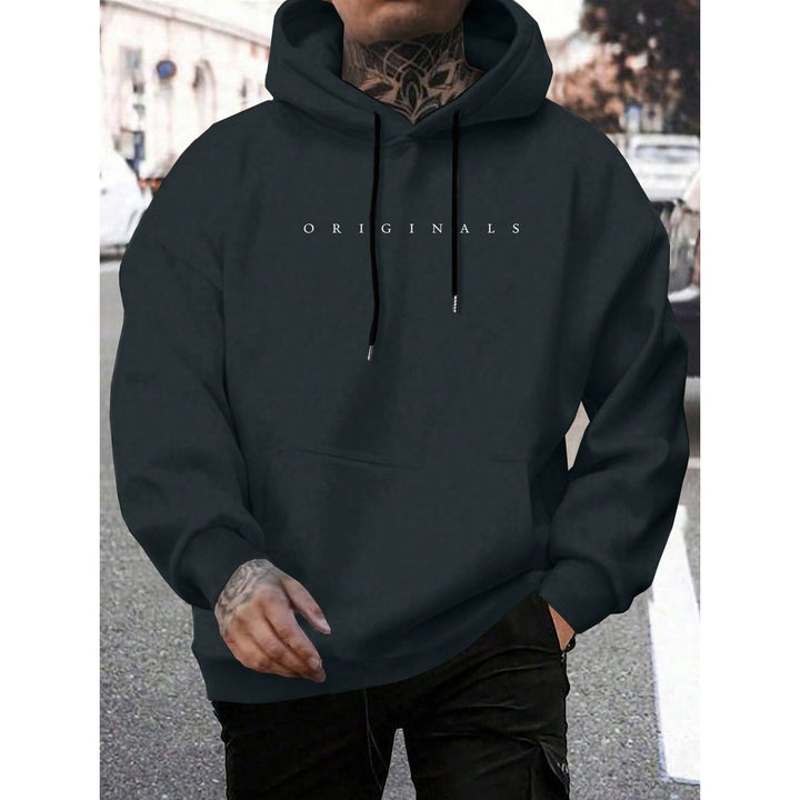 Felpa oversize uomo con cappuccio, grafica distintiva, perfetta per un outfit streetwear comodo e cool.