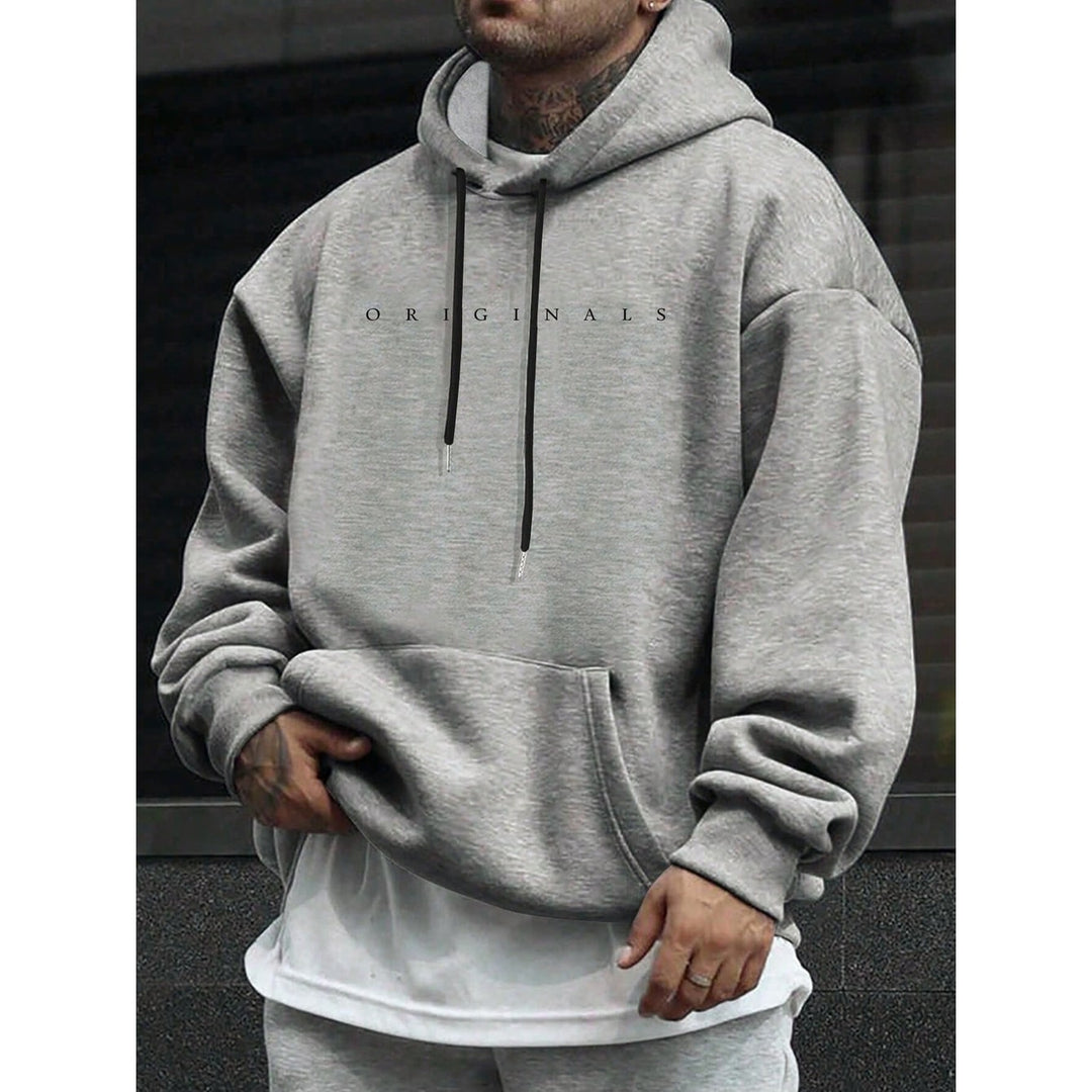 Felpa con cappuccio oversize da uomo, essenziale per comfort e moda casual in primavera/autunno.