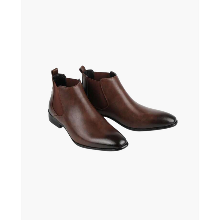 Versatili stivali Chelsea uomo per business e tempo libero. Modello elegante con inserti elastici per comodità.