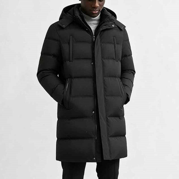 Cappotto piumino uomo trapuntato. Giacca invernale con cappuccio per un look casual e caldo.