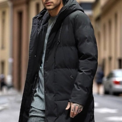 Piumino invernale uomo trapuntato con cappuccio, caldo e resistente al freddo.