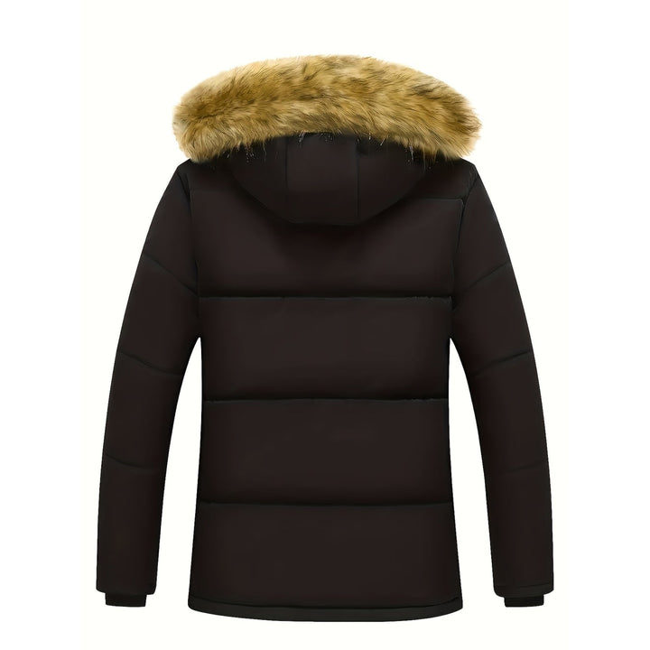 Giacca invernale da uomo, modello puffer trapuntato nero, con cappuccio e morbida pelliccia sintetica.