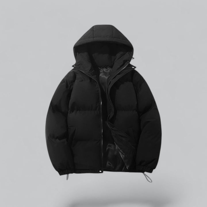 Giacca puffer trapuntata da uomo con cappuccio e coulisse, ideale per l'inverno casual.