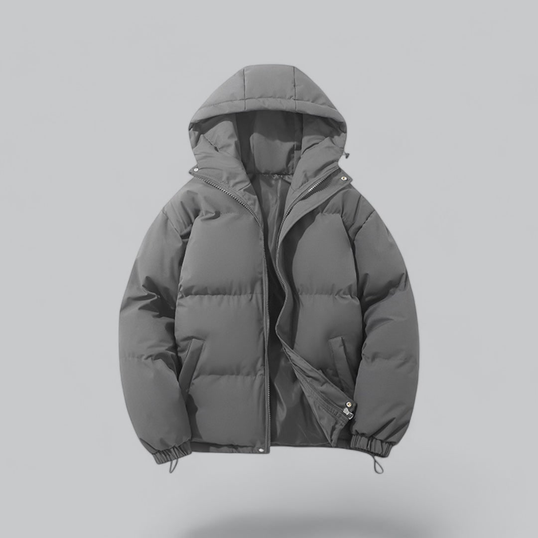 Elegante giacca trapuntata uomo puffer, con cappuccio regolabile, perfetta per il freddo urbano.