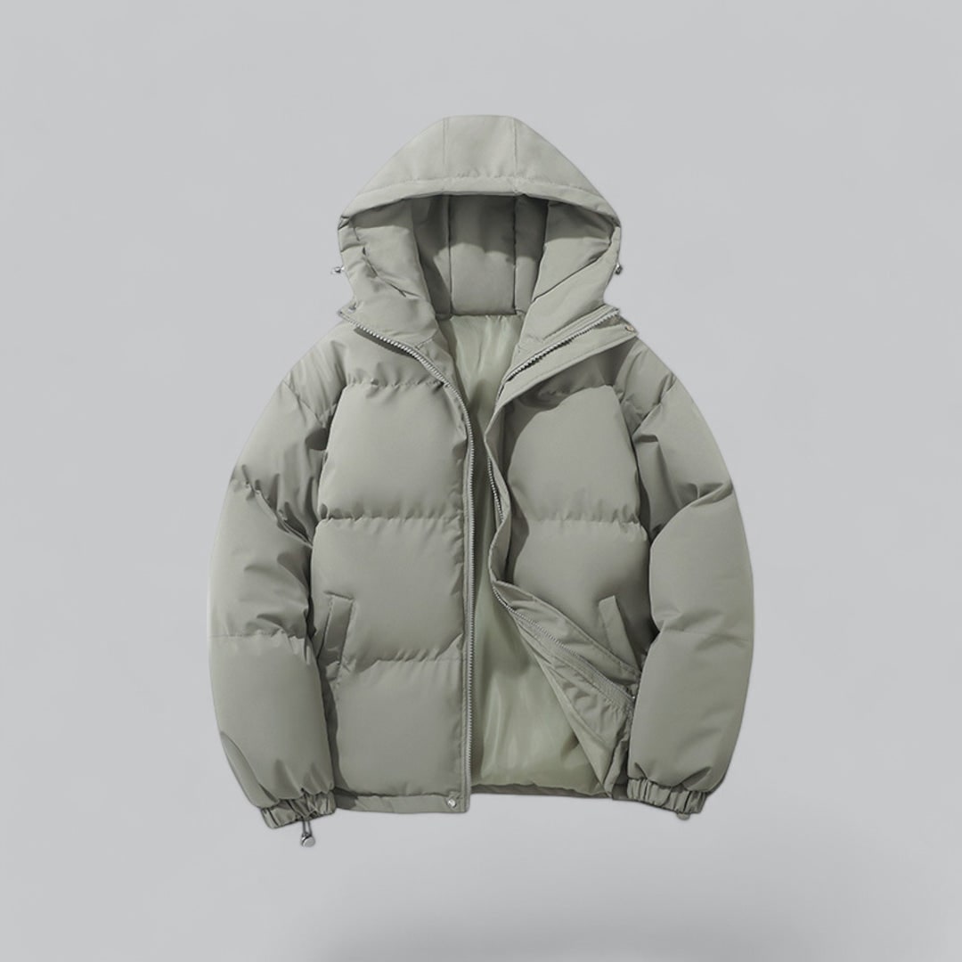 Giacca uomo casual, modello puffer trapuntato con cappuccio e coulisse, per moda e calore invernale.