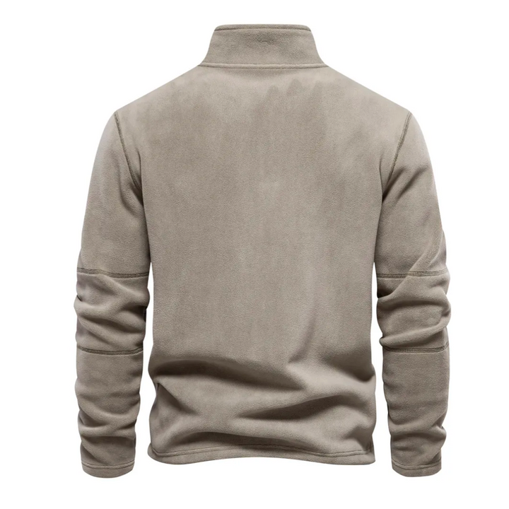 Pullover uomo quarter zip in tessuto morbido, collo alto per calore, perfetto per moda maschile e comfort quotidiano.