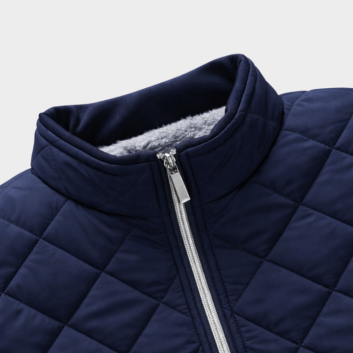 Elegante giacca bomber uomo trapuntata, calda e con fodera in pelliccia sintetica. Ideale autunno/inverno.