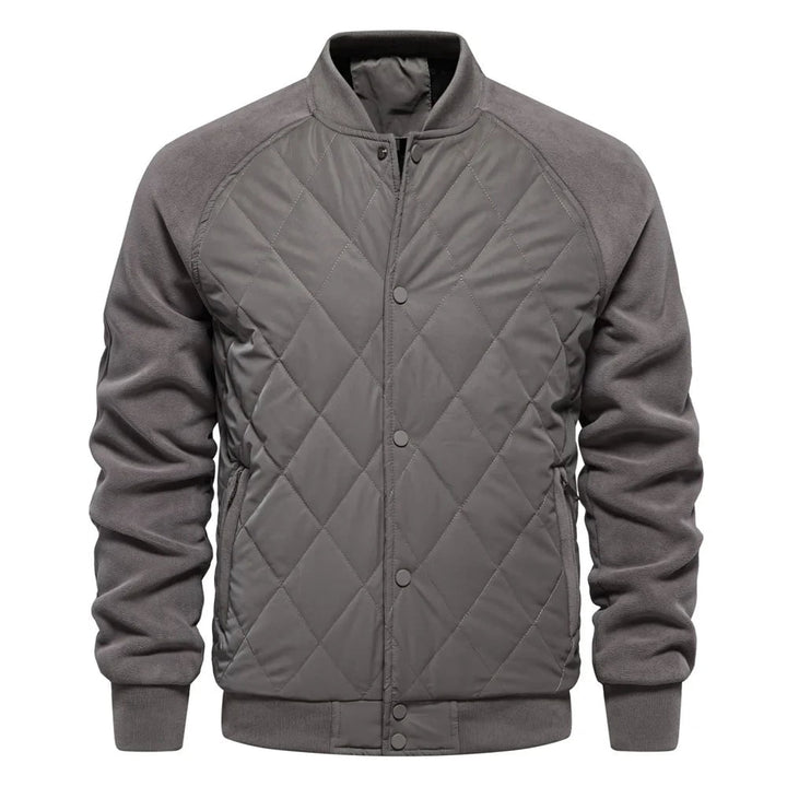 Giubbotto bomber da uomo trapuntato, stile sportivo-elegante, con maniche raglan in pile per la città.