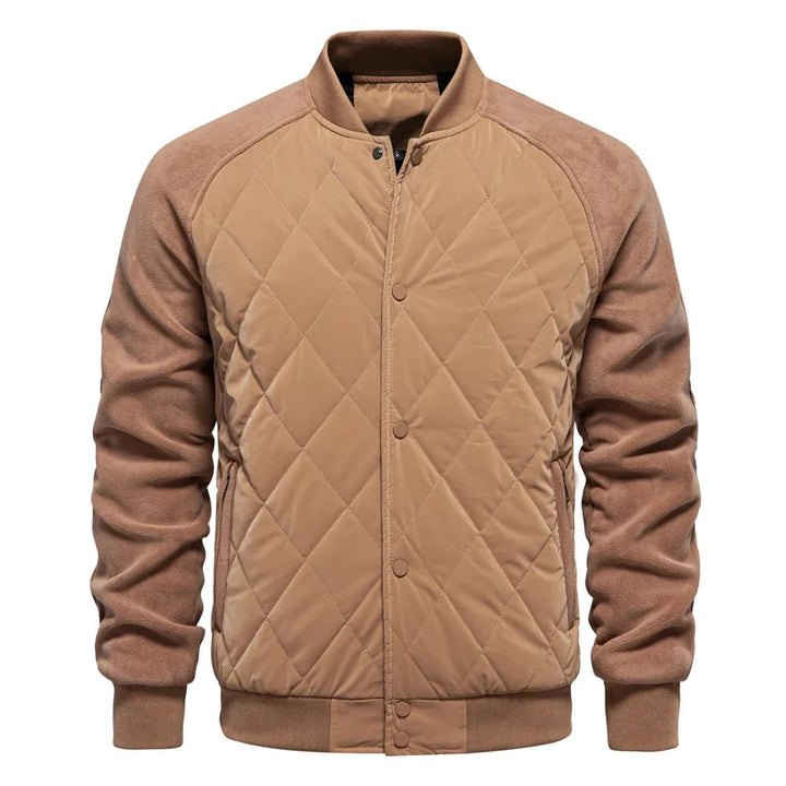 Bomber uomo trapuntato e sportivo, con maniche raglan in pile per un look di tendenza e funzionale.
