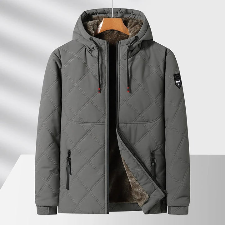 Giacca casual da uomo trapuntata, con cappuccio e zip. Perfetta per proteggerti dal freddo in inverno.